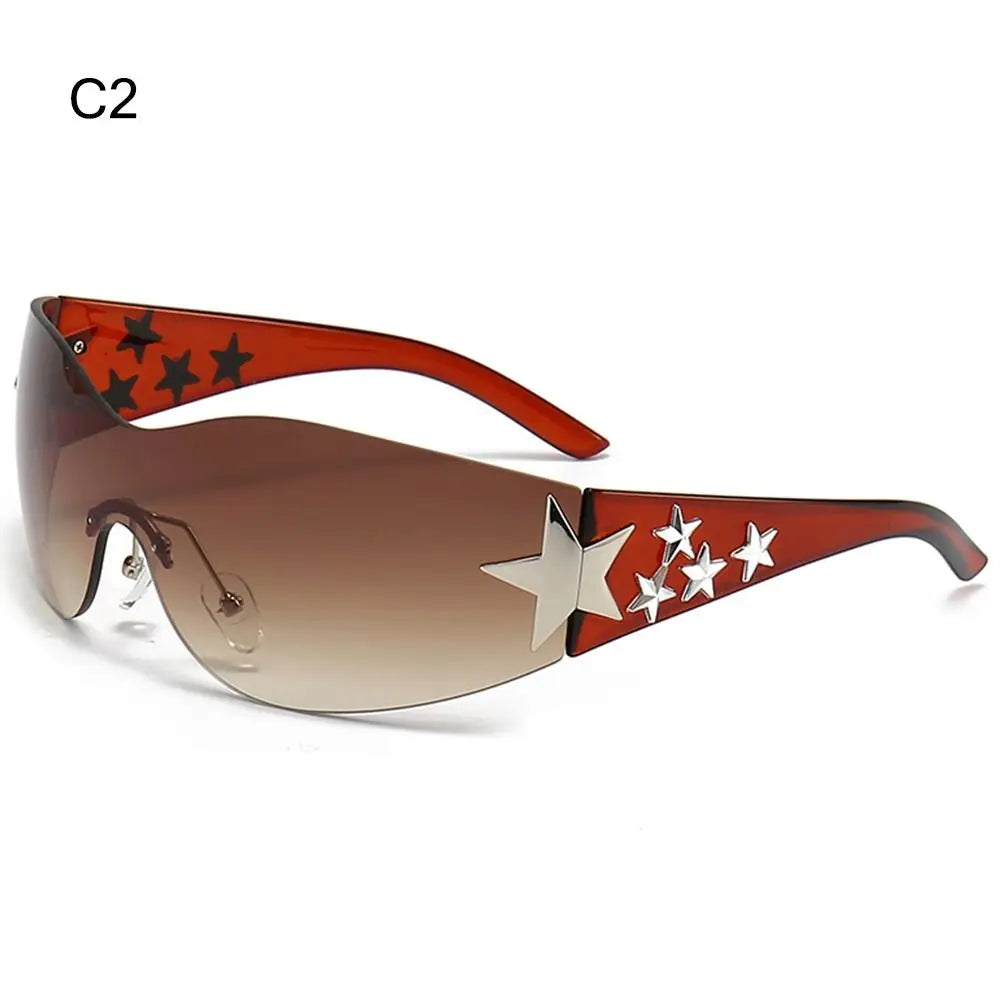 Star Power: Rimless Y2K Sunglasses for Trendsetters 🖤✨" Elevate your outdoor style with these rimless Y2K sunglasses, featuring a unique star wrap-around design perfect for men and women alike. 😎🌟