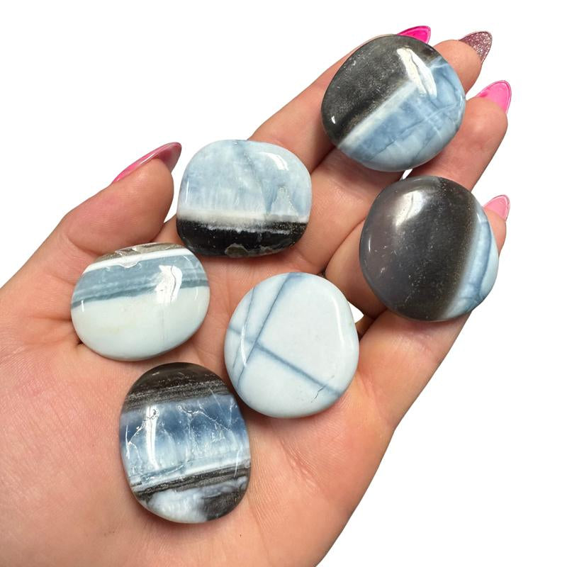 "Empower Your Energy: Natural Crystal Worry Stone 💎🌙" This gemstone coin pocket stone helps promote healing and focus, making it the perfect mini accessory for peace and balance on the go. 🌸✨