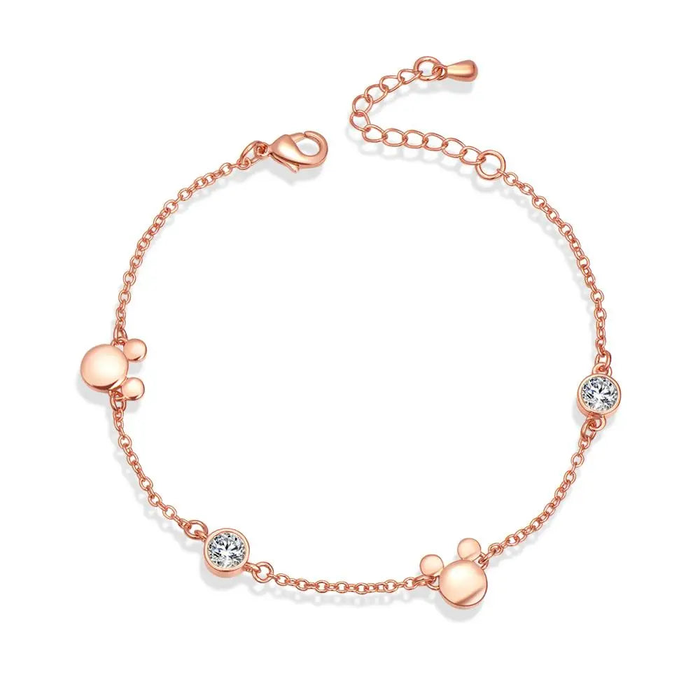 "Crystal Delight: Rose Gold Mickey Charm Bracelet 💎💖" Embrace the magic of Mickey with this new-style charm bracelet in rose gold, featuring sparkling crystal zircon for a dazzling effect. 🌟✨