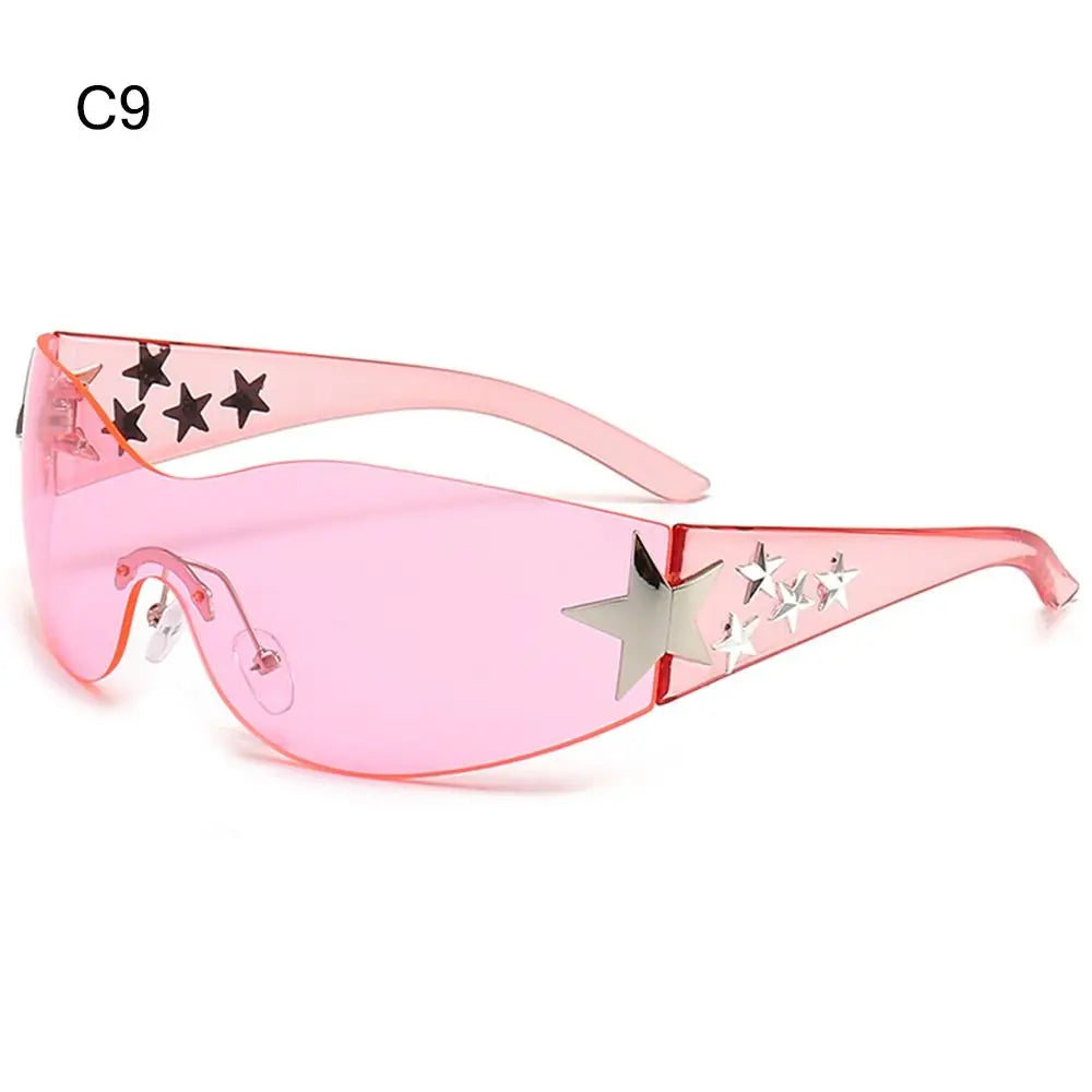 Star Power: Rimless Y2K Sunglasses for Trendsetters 🖤✨" Elevate your outdoor style with these rimless Y2K sunglasses, featuring a unique star wrap-around design perfect for men and women alike. 😎🌟