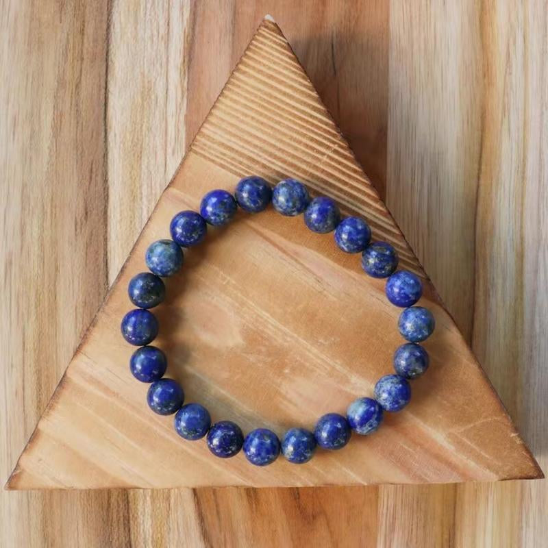 "Soul Connection: Lapis Lazuli Friendship Bracelet 💙✨" Strengthen your bond with this beautiful 8mm Lapis Lazuli beaded bracelet, perfect for kids, men, women, and couples seeking crystal healing. 🌟💎