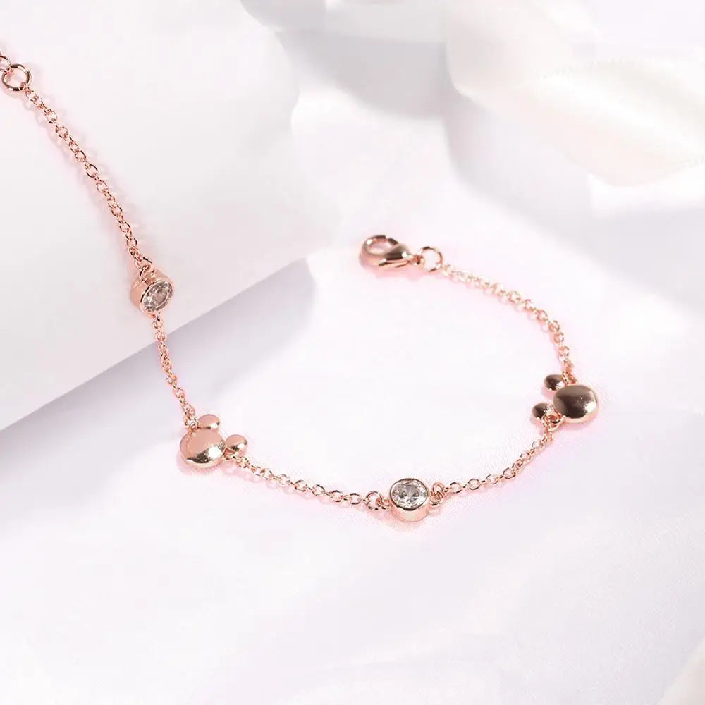 "Crystal Delight: Rose Gold Mickey Charm Bracelet 💎💖" Embrace the magic of Mickey with this new-style charm bracelet in rose gold, featuring sparkling crystal zircon for a dazzling effect. 🌟✨