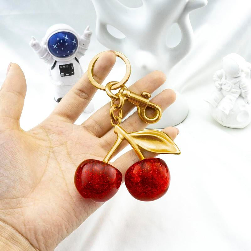 Fruitful Fashion: Cute Cherry Keychain 🍒💎" This adorable cherry keychain is a must-have accessory for women and girls—trendy, all-match, and ideal for gifting on any occasion. 🌟💖