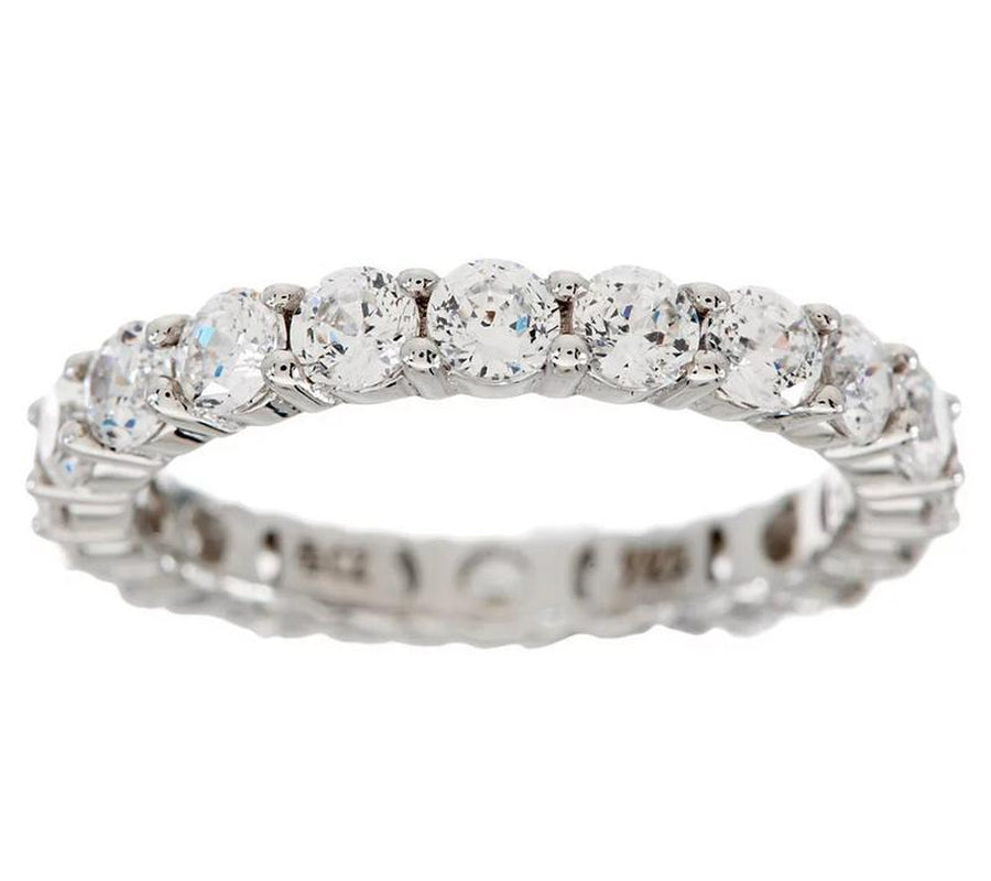 "Infinite Sparkle: Diamonique 100-Facet Eternity Ring 💎🌟" With 100 brilliant facets, this eternity band ring features the stunning clarity of Diamonique, available in 14K Clad or Sterling, making it a symbol of everlasting beauty. 💖💍