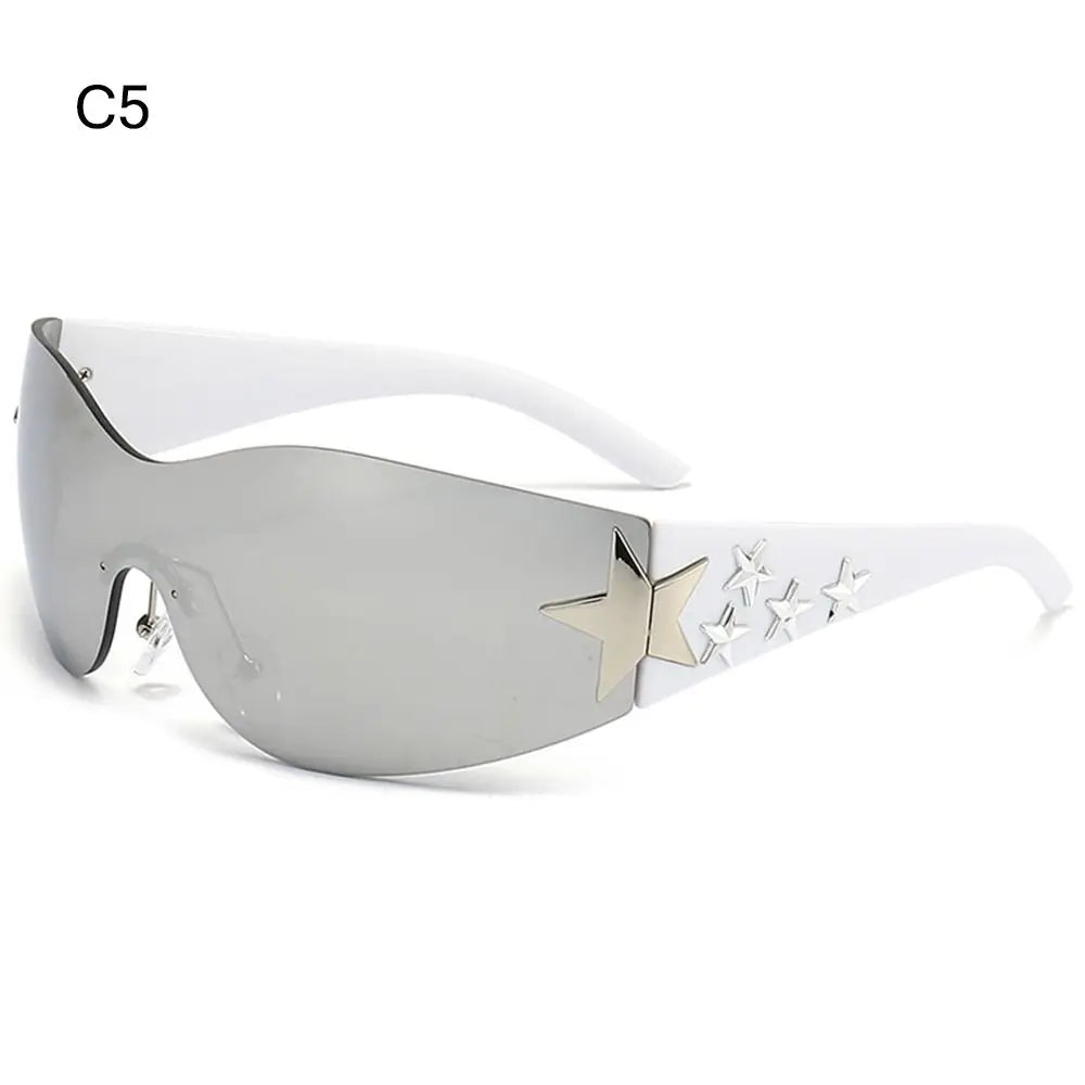 Star Power: Rimless Y2K Sunglasses for Trendsetters 🖤✨" Elevate your outdoor style with these rimless Y2K sunglasses, featuring a unique star wrap-around design perfect for men and women alike. 😎🌟