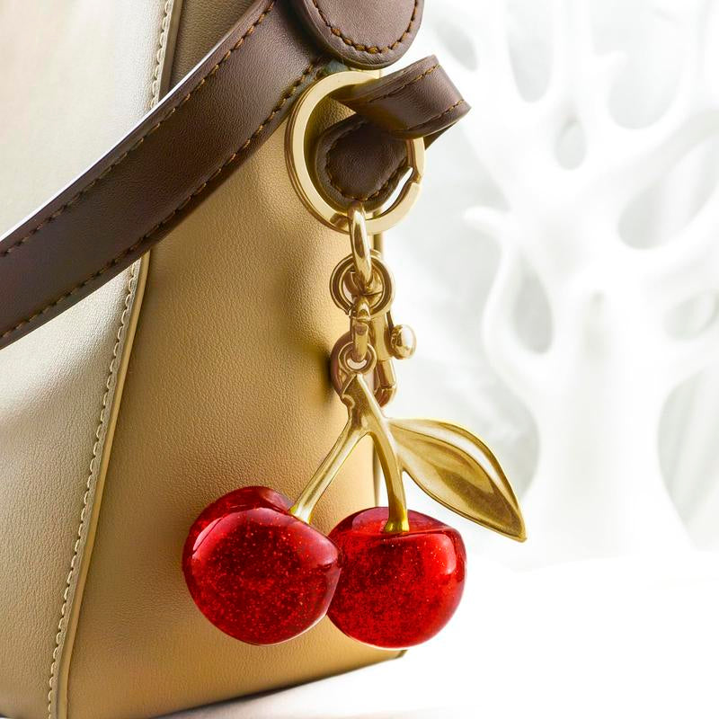 Fruitful Fashion: Cute Cherry Keychain 🍒💎" This adorable cherry keychain is a must-have accessory for women and girls—trendy, all-match, and ideal for gifting on any occasion. 🌟💖