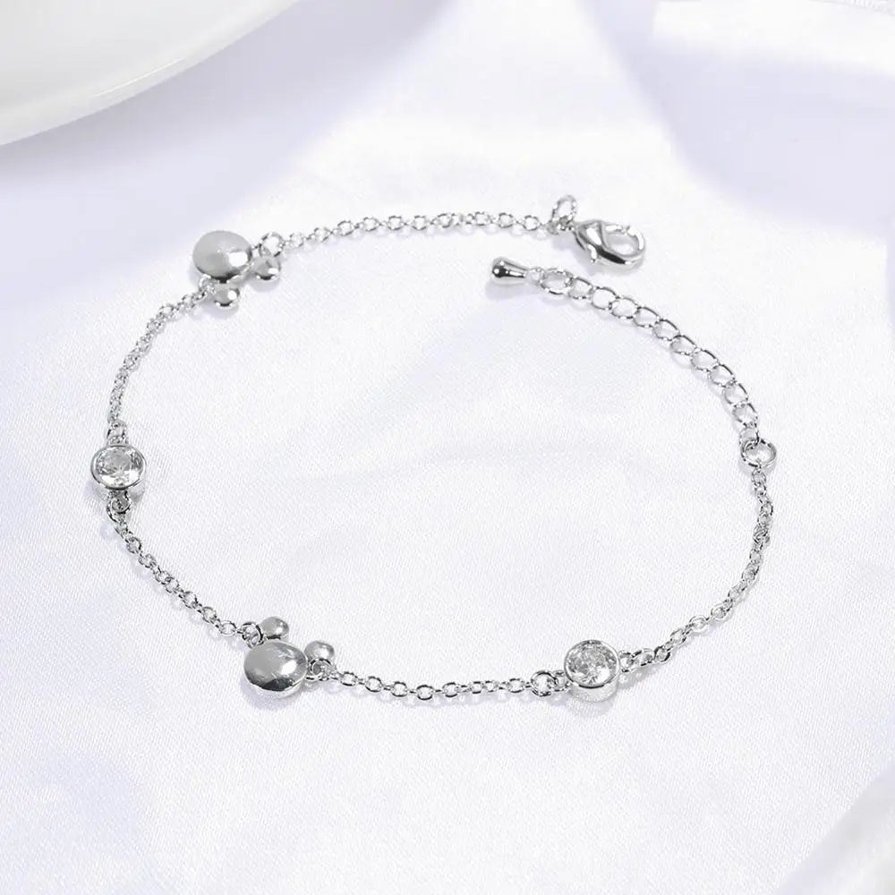 "Crystal Delight: Rose Gold Mickey Charm Bracelet 💎💖" Embrace the magic of Mickey with this new-style charm bracelet in rose gold, featuring sparkling crystal zircon for a dazzling effect. 🌟✨