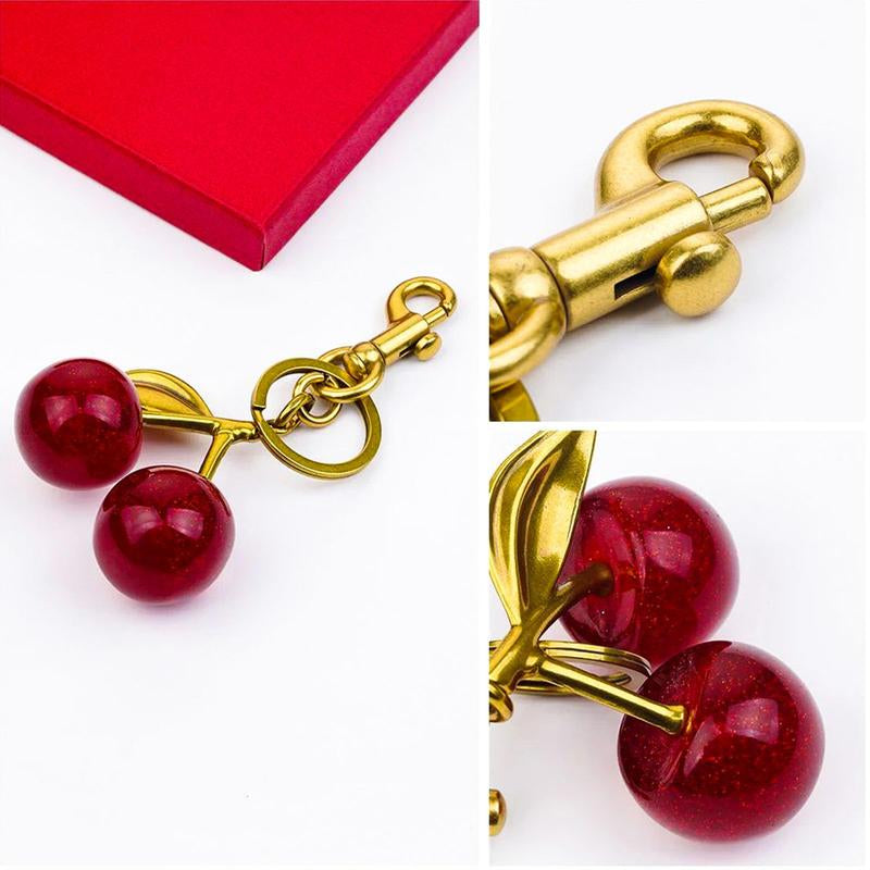 Fruitful Fashion: Cute Cherry Keychain 🍒💎" This adorable cherry keychain is a must-have accessory for women and girls—trendy, all-match, and ideal for gifting on any occasion. 🌟💖