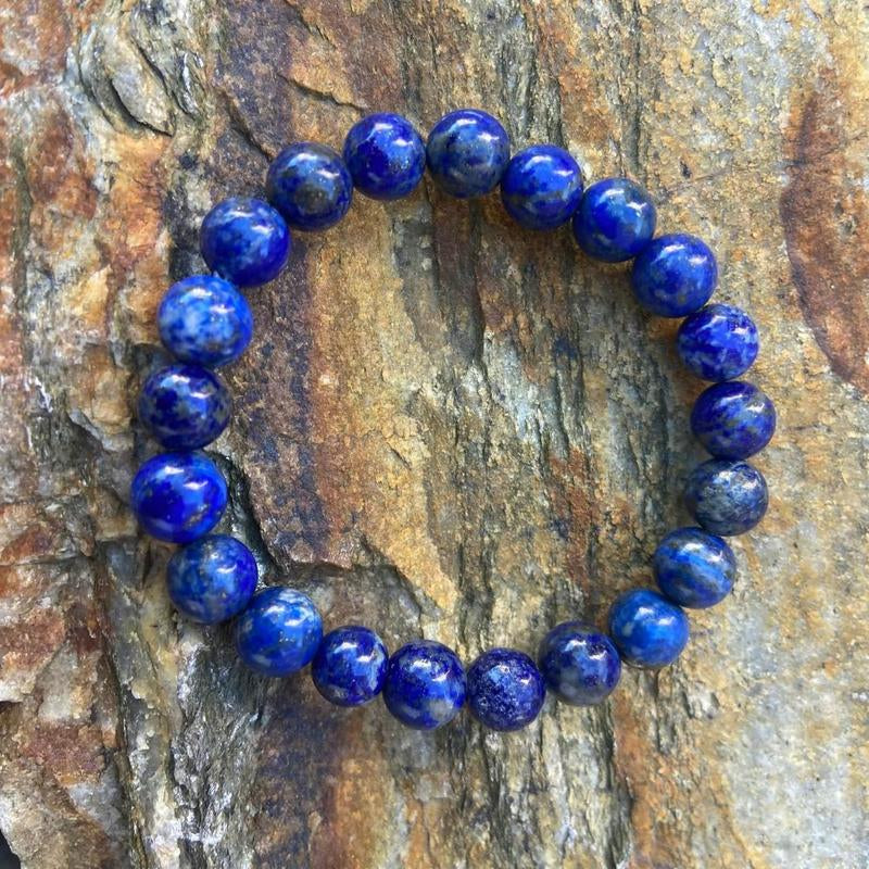 "Soul Connection: Lapis Lazuli Friendship Bracelet 💙✨" Strengthen your bond with this beautiful 8mm Lapis Lazuli beaded bracelet, perfect for kids, men, women, and couples seeking crystal healing. 🌟💎