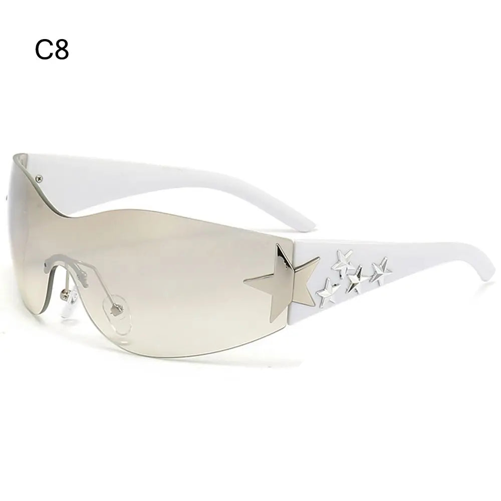 Star Power: Rimless Y2K Sunglasses for Trendsetters 🖤✨" Elevate your outdoor style with these rimless Y2K sunglasses, featuring a unique star wrap-around design perfect for men and women alike. 😎🌟