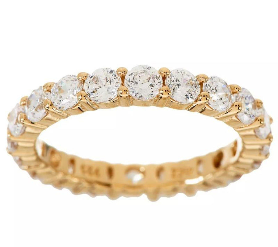 "Infinite Sparkle: Diamonique 100-Facet Eternity Ring 💎🌟" With 100 brilliant facets, this eternity band ring features the stunning clarity of Diamonique, available in 14K Clad or Sterling, making it a symbol of everlasting beauty. 💖💍