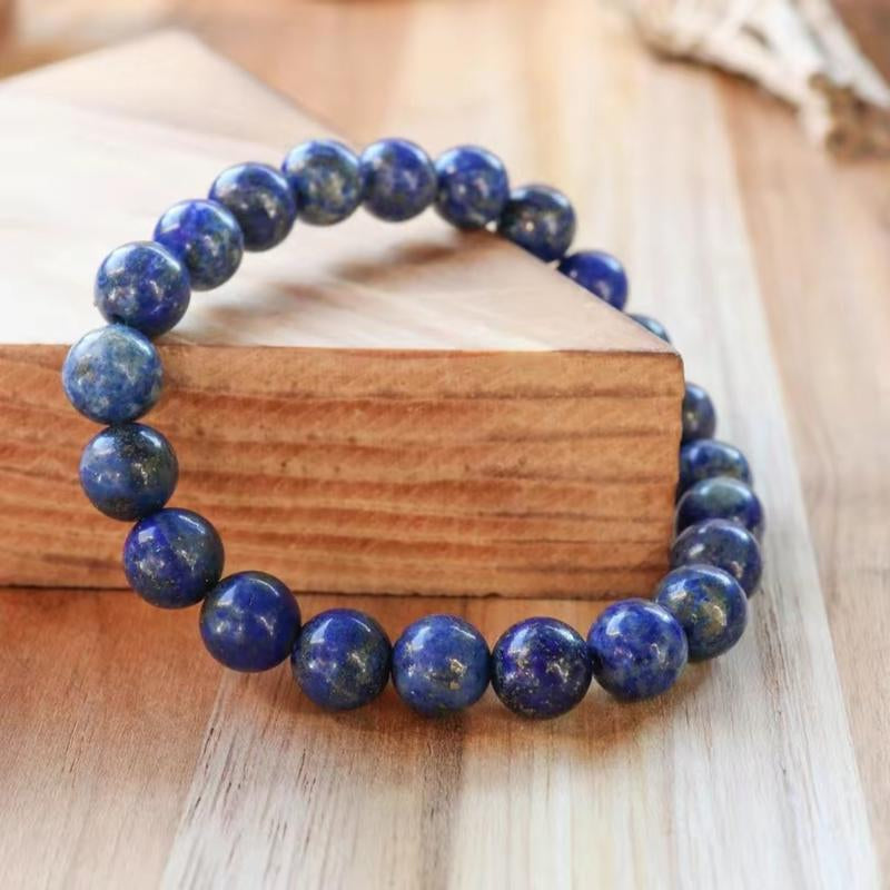 "Soul Connection: Lapis Lazuli Friendship Bracelet 💙✨" Strengthen your bond with this beautiful 8mm Lapis Lazuli beaded bracelet, perfect for kids, men, women, and couples seeking crystal healing. 🌟💎
