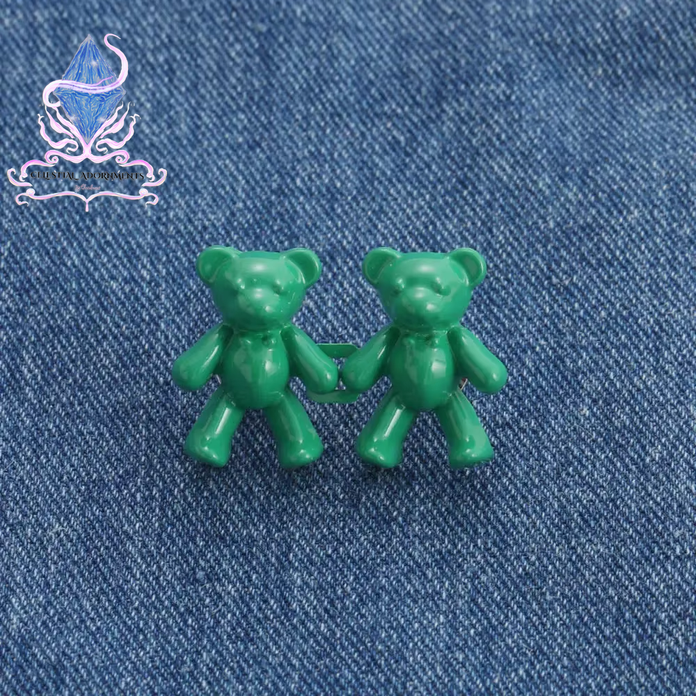 "Bear-ly Fit: Adjustable Jean Button Pins 🐻👖" Instantly tighten your jeans with these adorable bear-shaped button pins—no sewing required! Perfect for a cute, quick fix. ✨💖