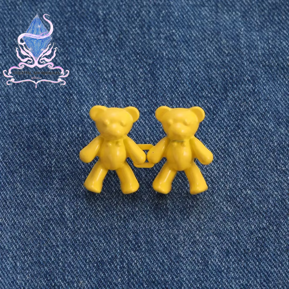 "Bear-ly Fit: Adjustable Jean Button Pins 🐻👖" Instantly tighten your jeans with these adorable bear-shaped button pins—no sewing required! Perfect for a cute, quick fix. ✨💖