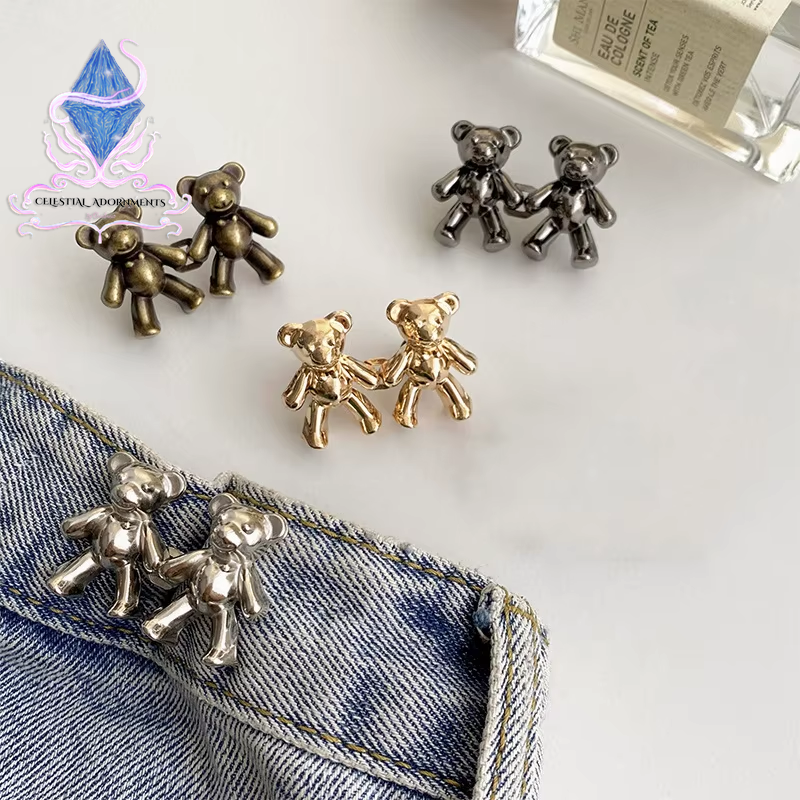 "Bear-ly Fit: Adjustable Jean Button Pins 🐻👖" Instantly tighten your jeans with these adorable bear-shaped button pins—no sewing required! Perfect for a cute, quick fix. ✨💖