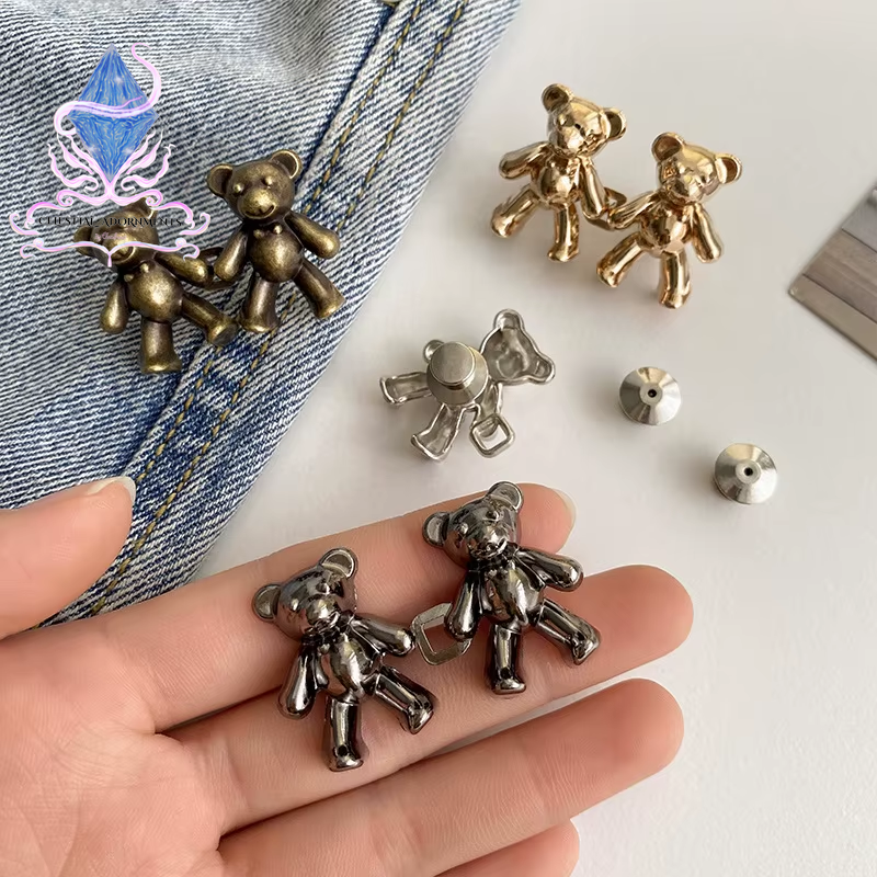 "Bear-ly Fit: Adjustable Jean Button Pins 🐻👖" Instantly tighten your jeans with these adorable bear-shaped button pins—no sewing required! Perfect for a cute, quick fix. ✨💖