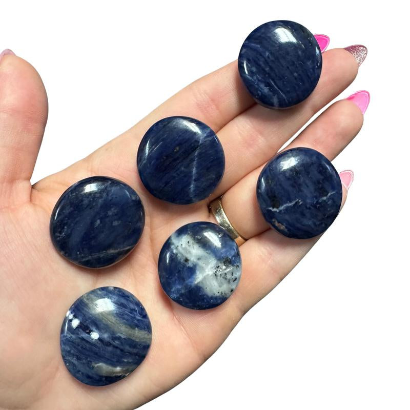 "Empower Your Energy: Natural Crystal Worry Stone 💎🌙"  This gemstone coin pocket stone helps promote healing and focus, making it the perfect mini accessory for peace and balance on the go. 🌸✨