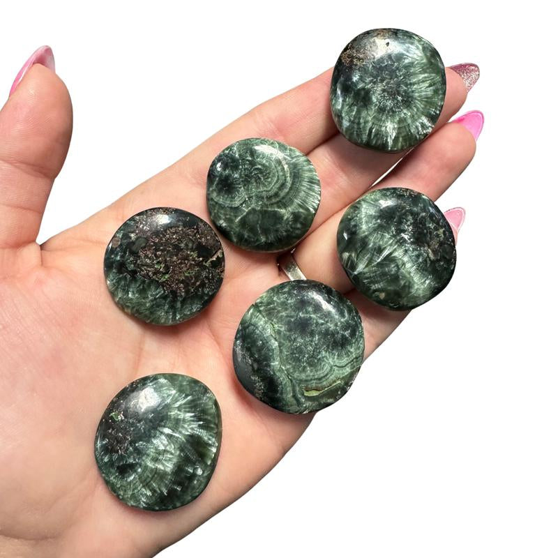 "Empower Your Energy: Natural Crystal Worry Stone 💎🌙"  This gemstone coin pocket stone helps promote healing and focus, making it the perfect mini accessory for peace and balance on the go. 🌸✨