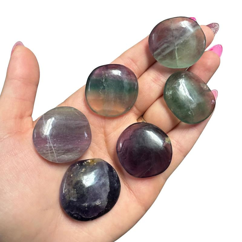 "Empower Your Energy: Natural Crystal Worry Stone 💎🌙"  This gemstone coin pocket stone helps promote healing and focus, making it the perfect mini accessory for peace and balance on the go. 🌸✨