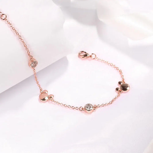 "Crystal Delight: Rose Gold Mickey Charm Bracelet 💎💖"  Embrace the magic of Mickey with this new-style charm bracelet in rose gold, featuring sparkling crystal zircon for a dazzling effect. 🌟✨