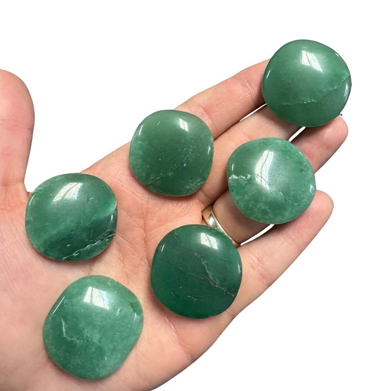 "Empower Your Energy: Natural Crystal Worry Stone 💎🌙"  This gemstone coin pocket stone helps promote healing and focus, making it the perfect mini accessory for peace and balance on the go. 🌸✨