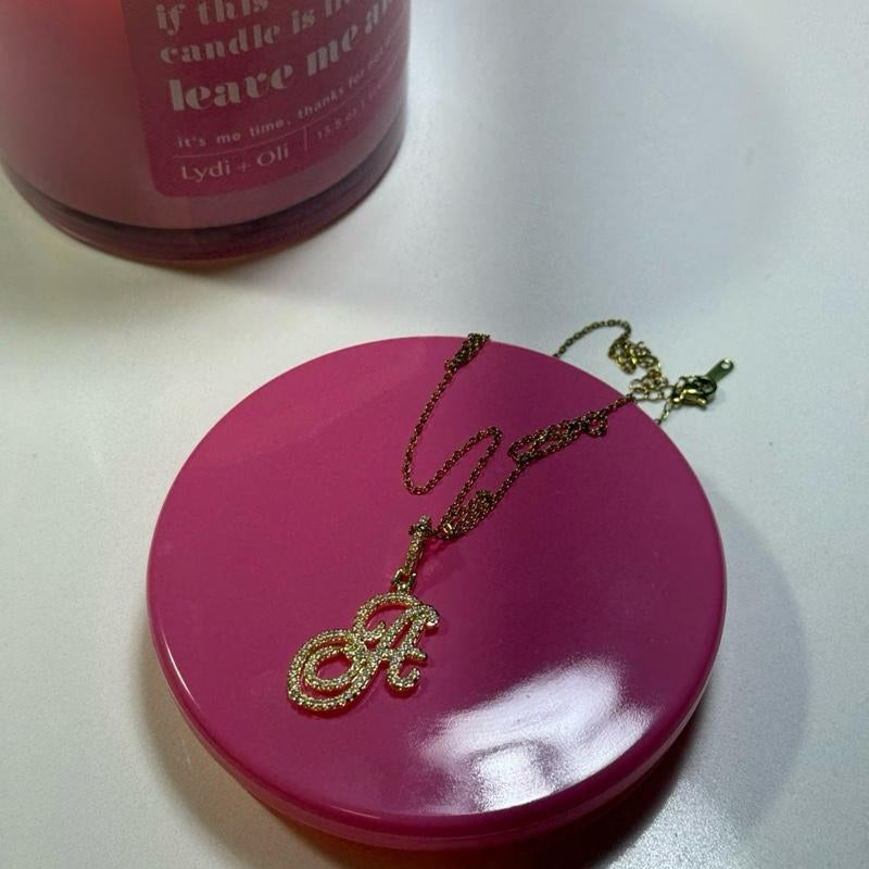 "Personalized Elegance: Custom Script Initial Necklace ✨💖"  Make it yours with this personalized script initial necklace, crafted from stainless steel for a stylish and meaningful touch. 💎🌟