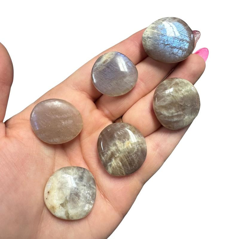 "Empower Your Energy: Natural Crystal Worry Stone 💎🌙"  This gemstone coin pocket stone helps promote healing and focus, making it the perfect mini accessory for peace and balance on the go. 🌸✨
