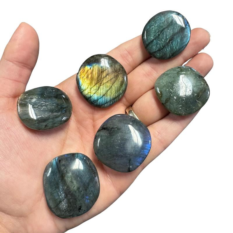 "Empower Your Energy: Natural Crystal Worry Stone 💎🌙"  This gemstone coin pocket stone helps promote healing and focus, making it the perfect mini accessory for peace and balance on the go. 🌸✨