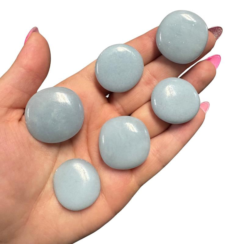 "Empower Your Energy: Natural Crystal Worry Stone 💎🌙"  This gemstone coin pocket stone helps promote healing and focus, making it the perfect mini accessory for peace and balance on the go. 🌸✨