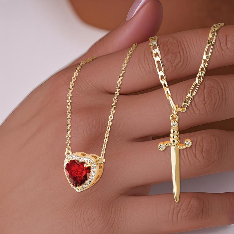 Eternal Love: Heart & Dagger Cross Pendant Necklace 💖⚔️"  A stunning gift for couples, this heart and rhinestone dagger cross pendant necklace blends elegance and bold style, perfect for expressing your unique bond. ✨💎