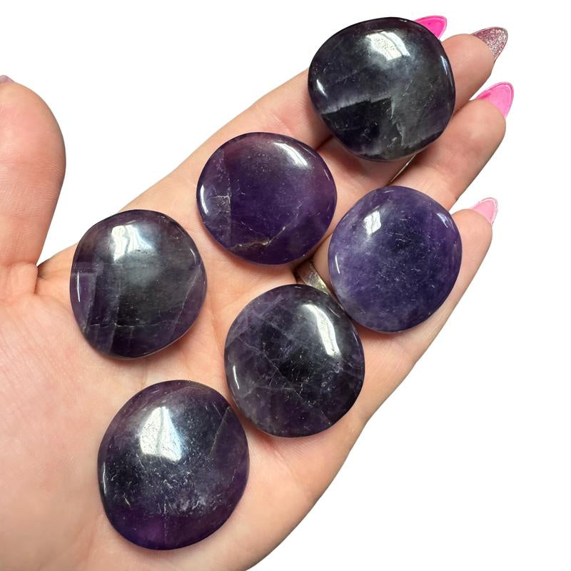 "Empower Your Energy: Natural Crystal Worry Stone 💎🌙"  This gemstone coin pocket stone helps promote healing and focus, making it the perfect mini accessory for peace and balance on the go. 🌸✨