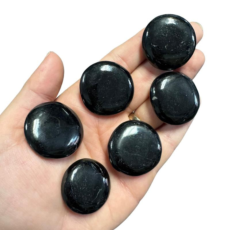 "Empower Your Energy: Natural Crystal Worry Stone 💎🌙"  This gemstone coin pocket stone helps promote healing and focus, making it the perfect mini accessory for peace and balance on the go. 🌸✨