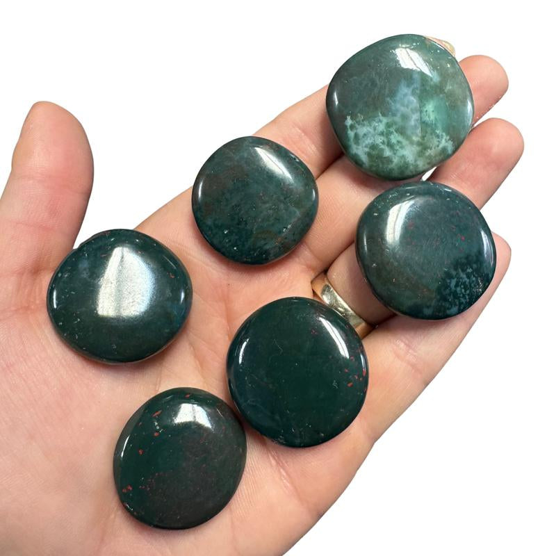 "Empower Your Energy: Natural Crystal Worry Stone 💎🌙"  This gemstone coin pocket stone helps promote healing and focus, making it the perfect mini accessory for peace and balance on the go. 🌸✨