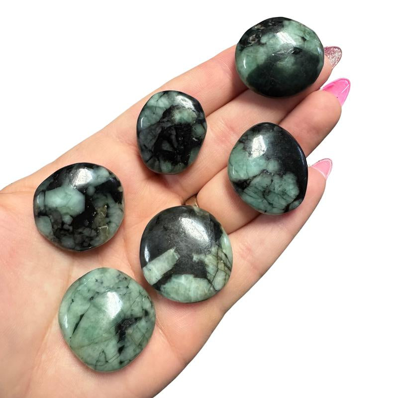 "Empower Your Energy: Natural Crystal Worry Stone 💎🌙"  This gemstone coin pocket stone helps promote healing and focus, making it the perfect mini accessory for peace and balance on the go. 🌸✨