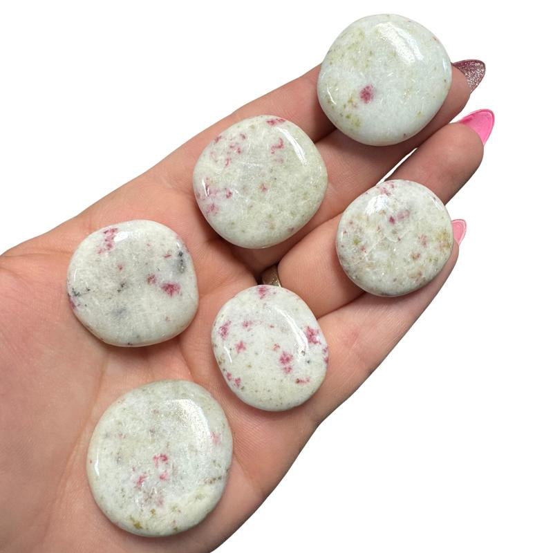 "Empower Your Energy: Natural Crystal Worry Stone 💎🌙"  This gemstone coin pocket stone helps promote healing and focus, making it the perfect mini accessory for peace and balance on the go. 🌸✨