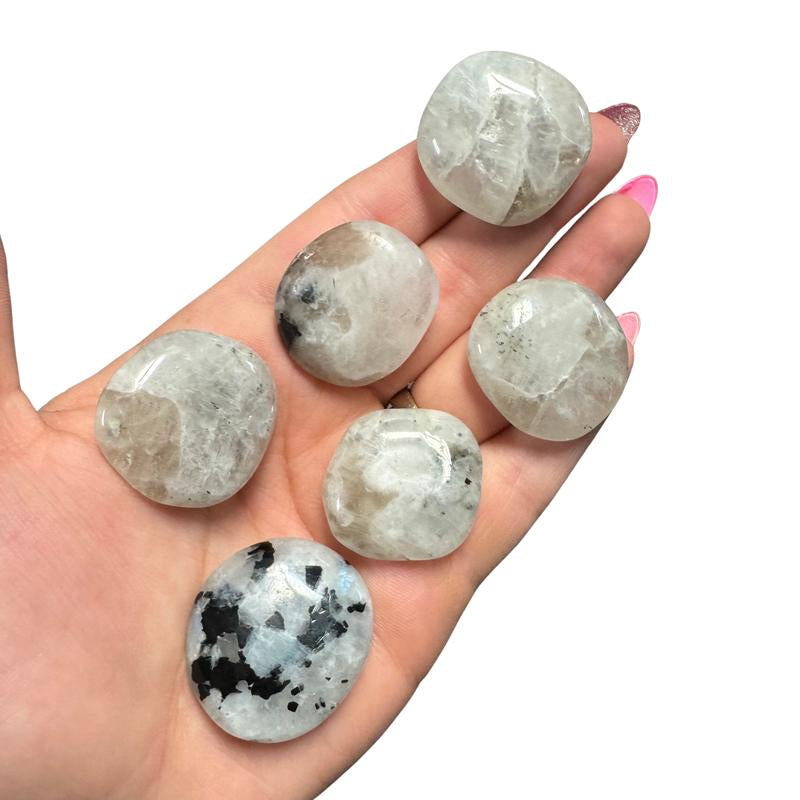 "Empower Your Energy: Natural Crystal Worry Stone 💎🌙"  This gemstone coin pocket stone helps promote healing and focus, making it the perfect mini accessory for peace and balance on the go. 🌸✨