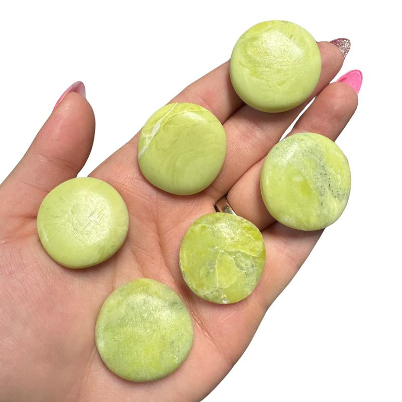 "Empower Your Energy: Natural Crystal Worry Stone 💎🌙"  This gemstone coin pocket stone helps promote healing and focus, making it the perfect mini accessory for peace and balance on the go. 🌸✨