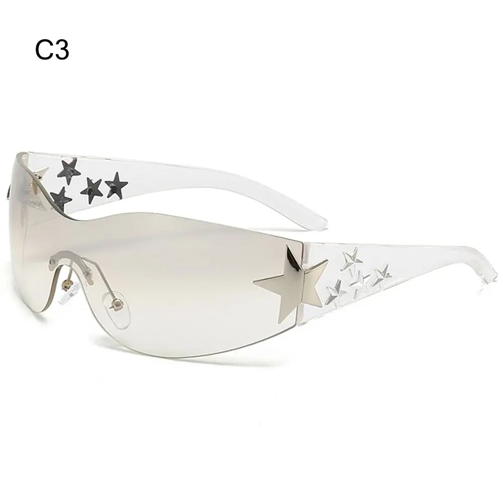 Star Power: Rimless Y2K Sunglasses for Trendsetters 🖤✨"  Elevate your outdoor style with these rimless Y2K sunglasses, featuring a unique star wrap-around design perfect for men and women alike. 😎🌟