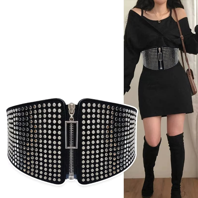 "Gothic Glam: Rivet Inlay Corset Belt for Women 🔥🖤"  Add an edge to your outfit with this wide elastic corset belt, complete with rivet inlays for a stunning gothic look that embraces punk and alternative style. ✨🖤