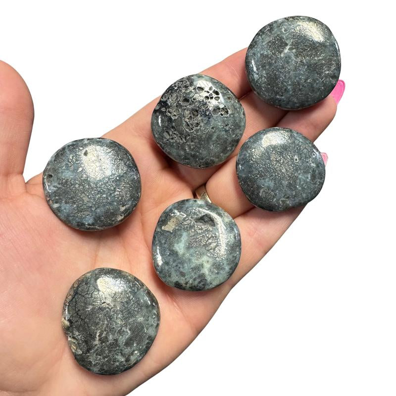 "Empower Your Energy: Natural Crystal Worry Stone 💎🌙"  This gemstone coin pocket stone helps promote healing and focus, making it the perfect mini accessory for peace and balance on the go. 🌸✨