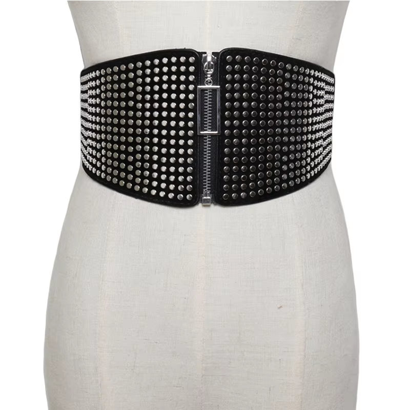 "Gothic Glam: Rivet Inlay Corset Belt for Women 🔥🖤"  Add an edge to your outfit with this wide elastic corset belt, complete with rivet inlays for a stunning gothic look that embraces punk and alternative style. ✨🖤
