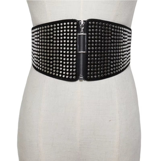 "Gothic Glam: Rivet Inlay Corset Belt for Women 🔥🖤"  Add an edge to your outfit with this wide elastic corset belt, complete with rivet inlays for a stunning gothic look that embraces punk and alternative style. ✨🖤