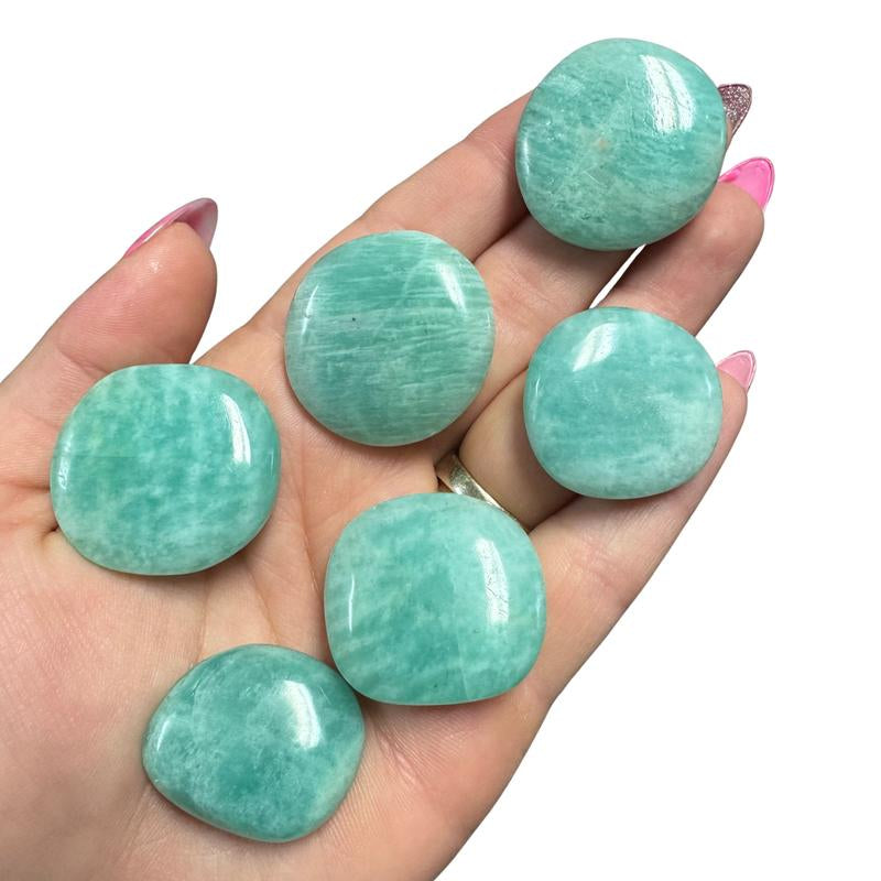 "Empower Your Energy: Natural Crystal Worry Stone 💎🌙"  This gemstone coin pocket stone helps promote healing and focus, making it the perfect mini accessory for peace and balance on the go. 🌸✨