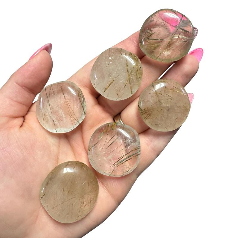 "Empower Your Energy: Natural Crystal Worry Stone 💎🌙"  This gemstone coin pocket stone helps promote healing and focus, making it the perfect mini accessory for peace and balance on the go. 🌸✨