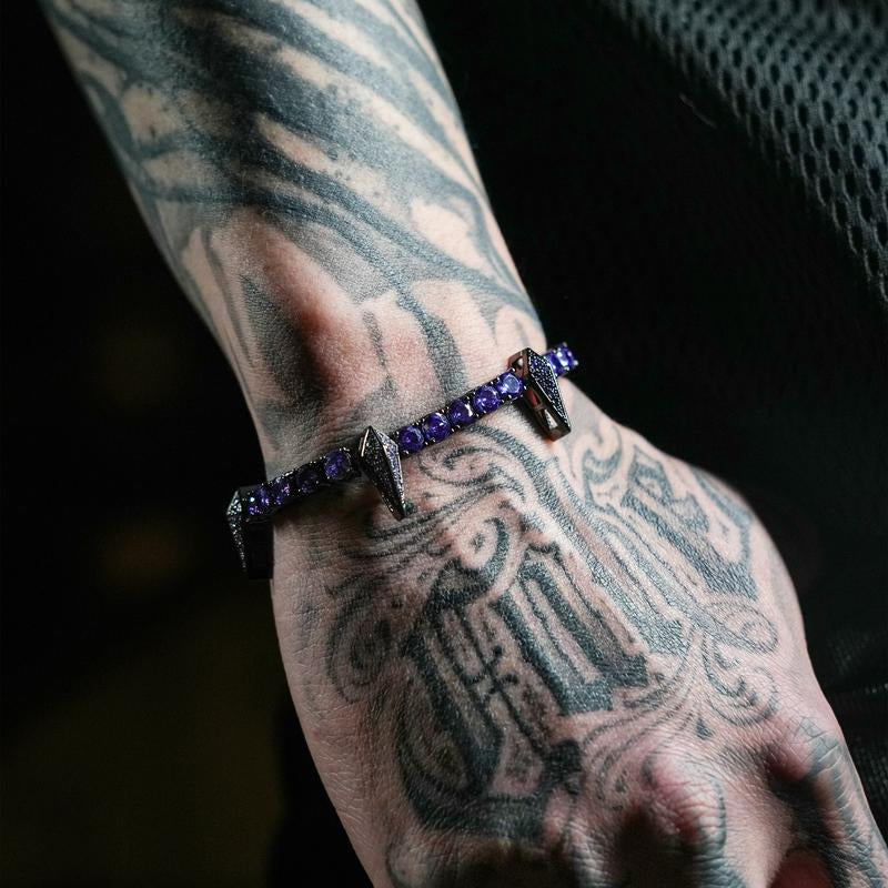 "King of Style: Black Panther Iced Out Bracelet 🖤💎"  Channel your inner strength with this bold Black Panther tennis bracelet, featuring premium CZ stones and a multi-color option for ultimate flair. 🔥👑