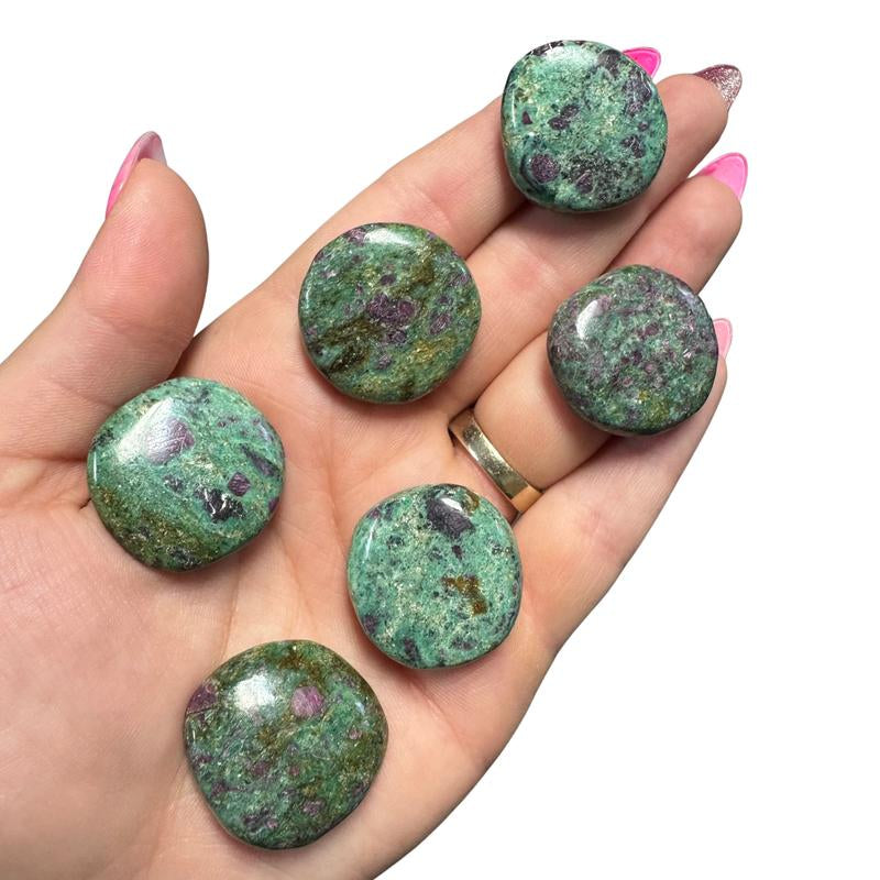 "Empower Your Energy: Natural Crystal Worry Stone 💎🌙"  This gemstone coin pocket stone helps promote healing and focus, making it the perfect mini accessory for peace and balance on the go. 🌸✨