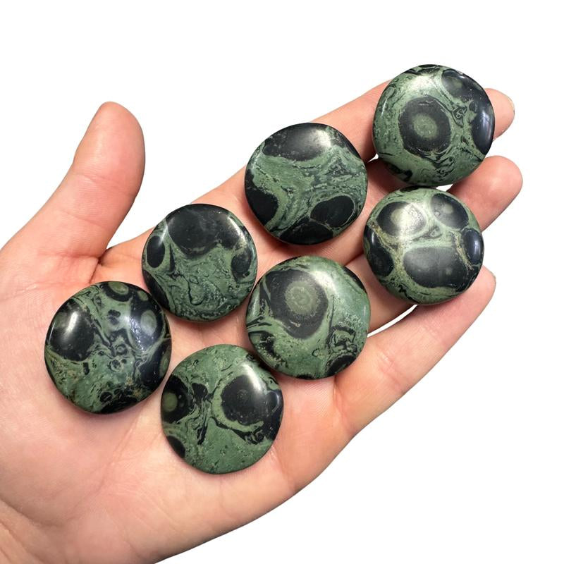"Empower Your Energy: Natural Crystal Worry Stone 💎🌙"  This gemstone coin pocket stone helps promote healing and focus, making it the perfect mini accessory for peace and balance on the go. 🌸✨