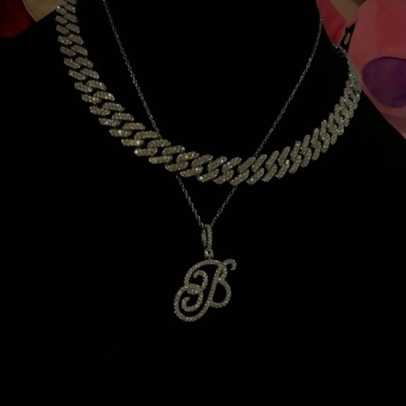 "Personalized Elegance: Custom Script Initial Necklace ✨💖"  Make it yours with this personalized script initial necklace, crafted from stainless steel for a stylish and meaningful touch. 💎🌟
