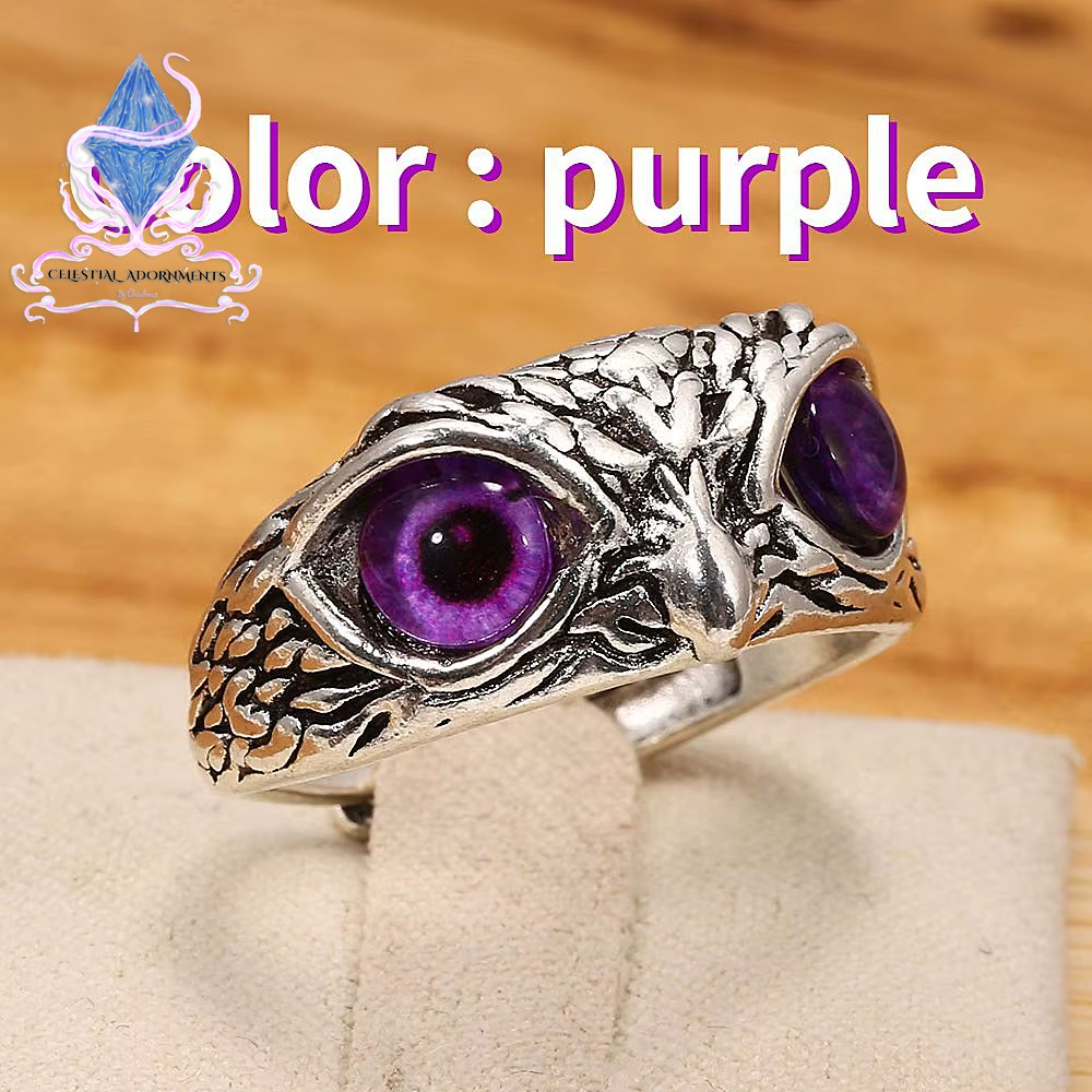 "Enchanting Owl: Colorful Cat Eye Gothic Ring 🦉✨"  A perfect blend of mysticism and style, this adjustable owl ring with a colorful cat-eye stone is a unique and trendy piece for both men and women. 💖💎