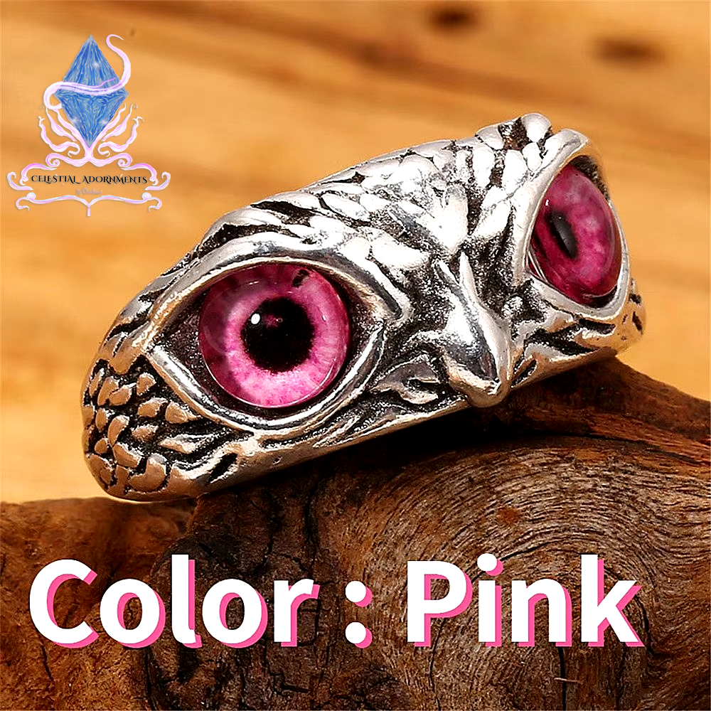 "Enchanting Owl: Colorful Cat Eye Gothic Ring 🦉✨"  A perfect blend of mysticism and style, this adjustable owl ring with a colorful cat-eye stone is a unique and trendy piece for both men and women. 💖💎